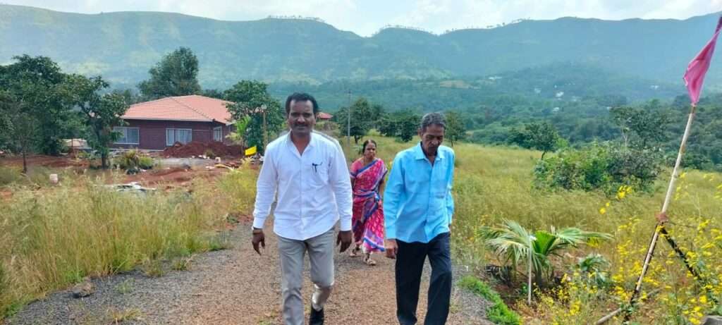 Mayurvan Valley site visit showcasing serene dam view and greenery near Bhor, perfect plot location